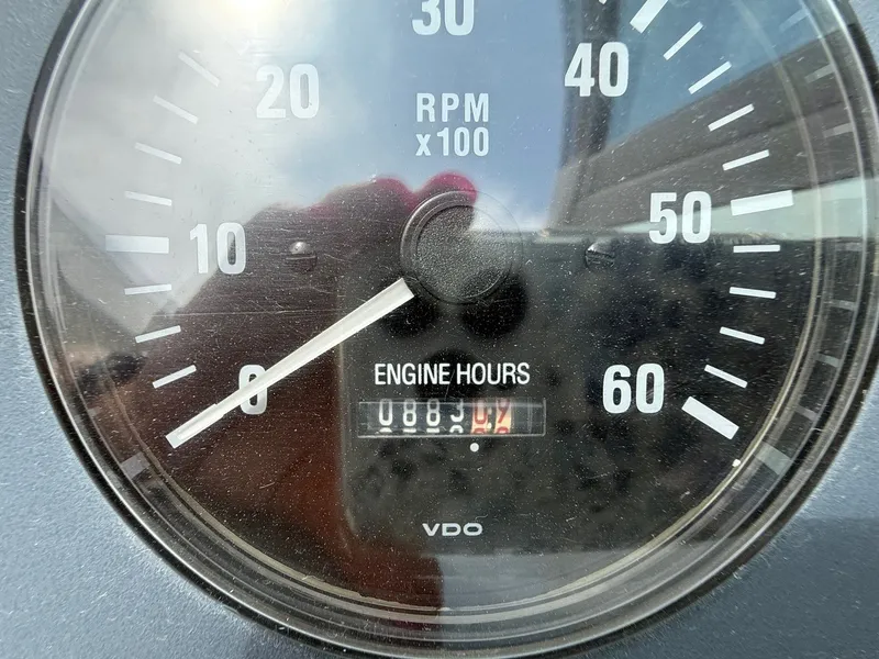 Slide: The Image of Close-up of a 1997 Formula 280SS tachometer showing engine hours and RPM. - 22