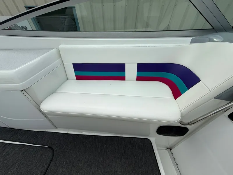 Slide: The Image of White boat seat with colorful stripes in a 1997 Formula 280SS. - 30