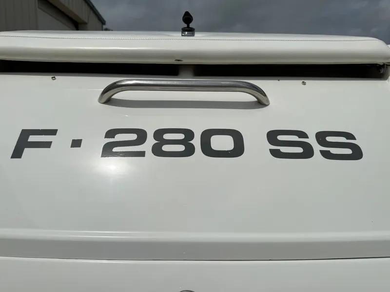 Slide: The Image of 1997 Formula 280SS boat rear view with model name displayed. - 5
