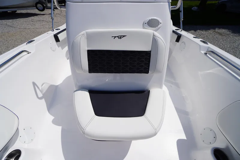 Slide: The Image of 2025 Tidewater 198 CC Adventure boat seat with black and white upholstery. - 14