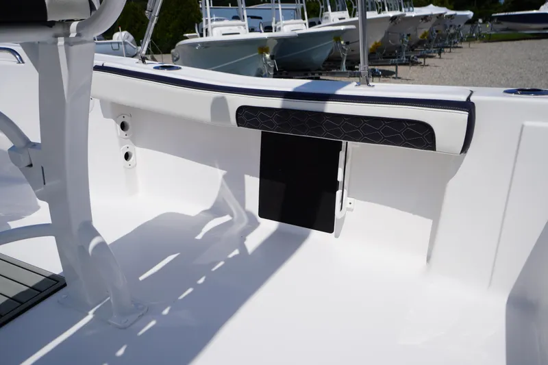 Slide: The Image of 2025 Tidewater 198 CC Adventure boat interior, featuring sleek seating and modern design elements. - 30