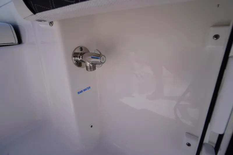 Slide: The Image of 2025 Tidewater 198 CC Adventure boat raw water outlet detail. - 32