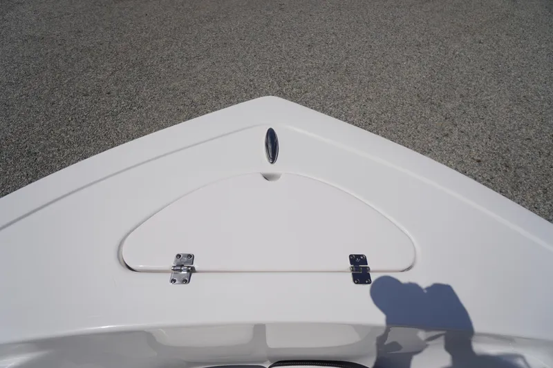 Slide: The Image of Bow of 2025 Tidewater 198 CC Adventure boat with storage compartment. - 4