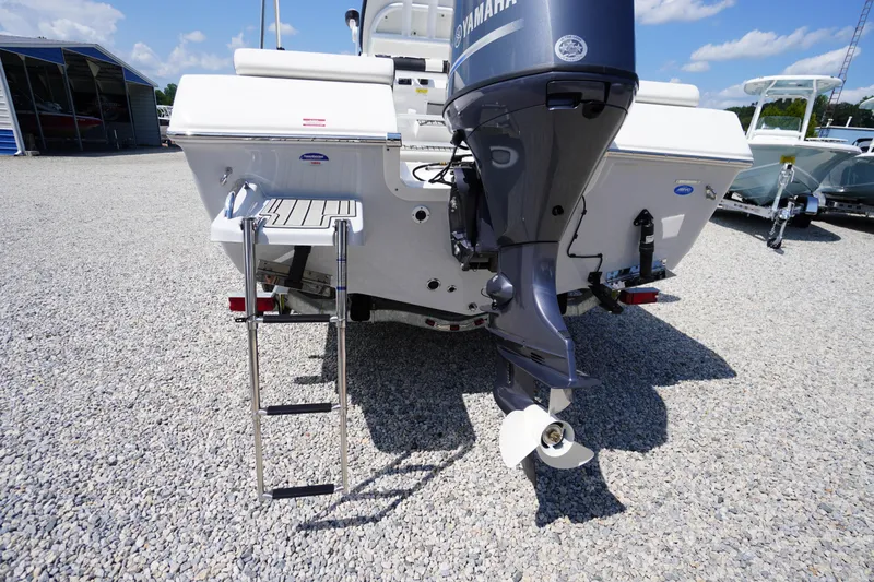 Slide: The Image of 2025 Tidewater 198 CC Adventure boat with Yamaha outboard motor and swim ladder. - 40