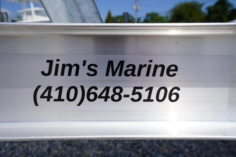 Slide: The Image of Jim's Marine contact sign on Tidewater 198 CC Adventure, 2025 model. - 44