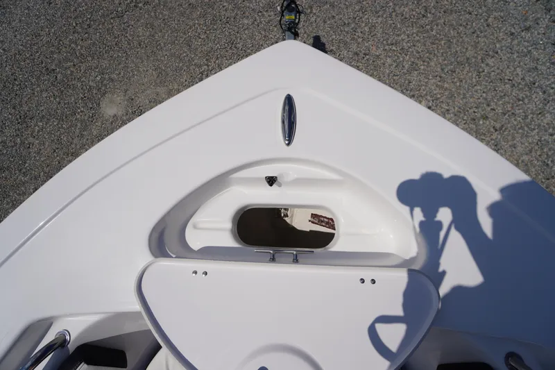 Slide: The Image of 2025 Tidewater 198 CC Adventure boat bow with anchor storage, viewed from above. - 5