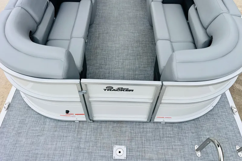 Slide: The Image of 2026 Sun Tracker Party Barge 22 DLX with gray seating and deck, top view. - 13