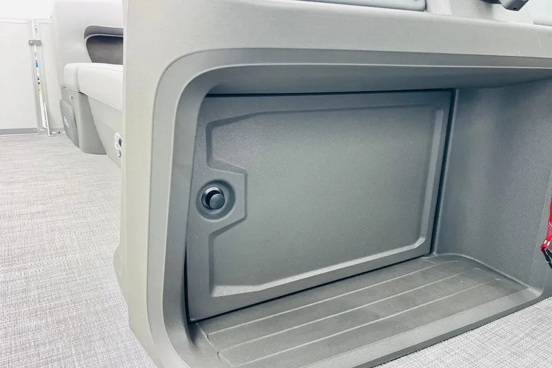 Slide: The Image of Storage compartment in 2026 Sun Tracker Party Barge 22 DLX pontoon boat interior. - 33