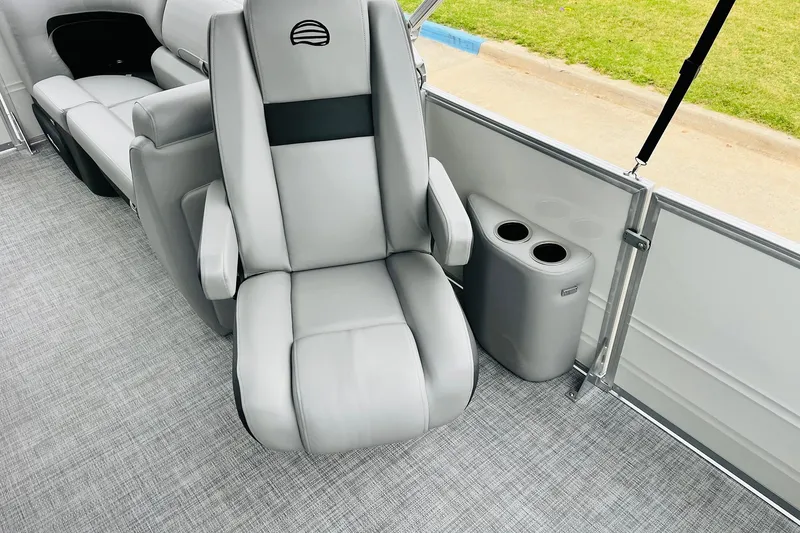 Slide: The Image of Luxurious seating on 2026 Sun Tracker Party Barge 22 DLX with cup holders and modern design. - 35