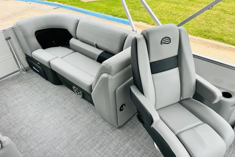 Slide: The Image of 2026 Sun Tracker Party Barge 22 DLX interior with gray seating and modern design. - 36