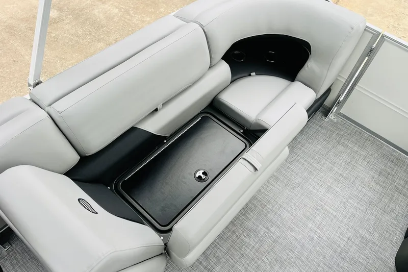 Slide: The Image of 2026 Sun Tracker Party Barge 22 DLX interior seating with storage compartment. - 43