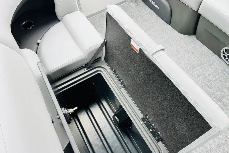 Slide: The Image of Open storage compartment on 2026 Sun Tracker Party Barge 22 DLX pontoon boat. - 44