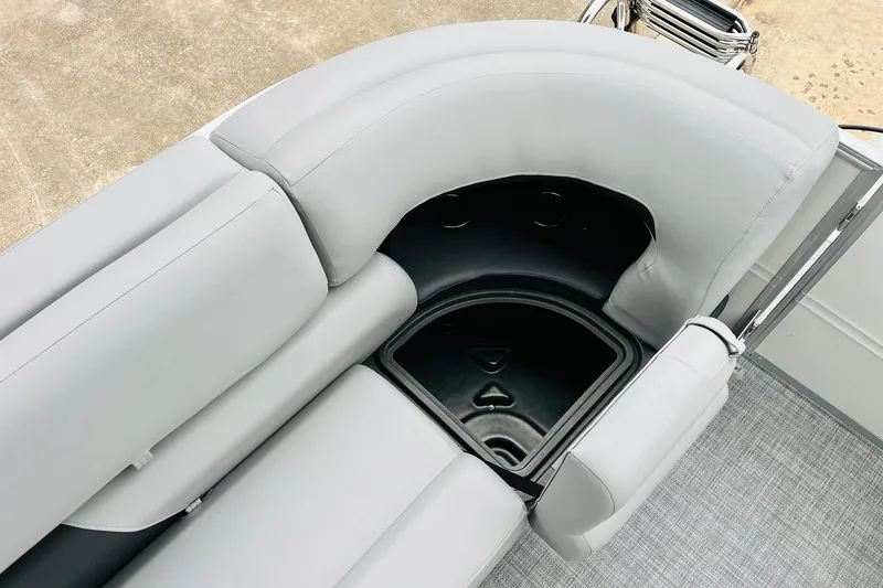 Slide: The Image of 2026 Sun Tracker Party Barge 22 DLX, featuring spacious seating and storage area. - 45