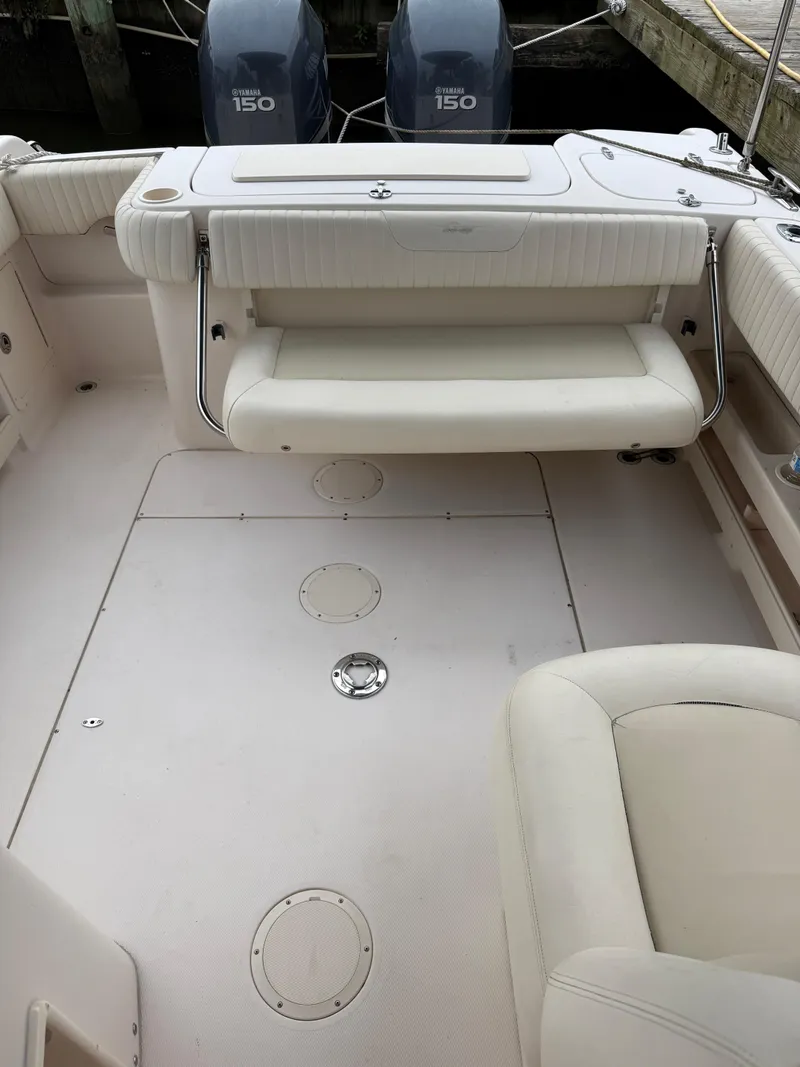 Slide: The Image of 2008 Grady-White Tournament 275 boat interior with Yamaha 150 engines. - 6