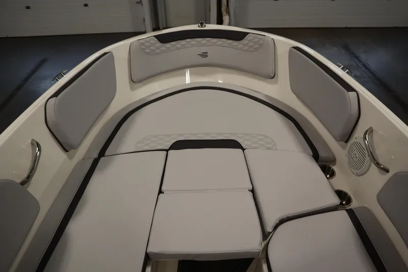 Slide: The Image of 2025 Bayliner M15 MX COMFORT PACKAGE boat interior with cushioned seating. - 11