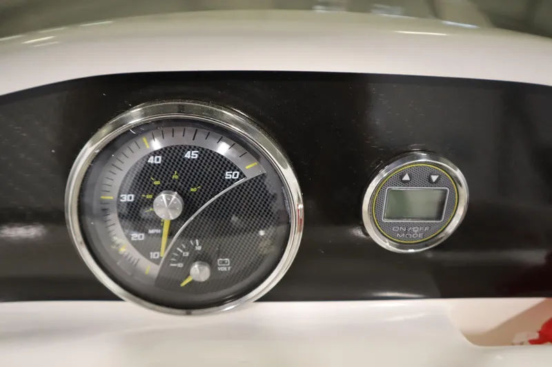 Slide: The Image of Dashboard of 2025 Bayliner M15 MX COMFORT PACKAGE with speedometer and digital display. - 19