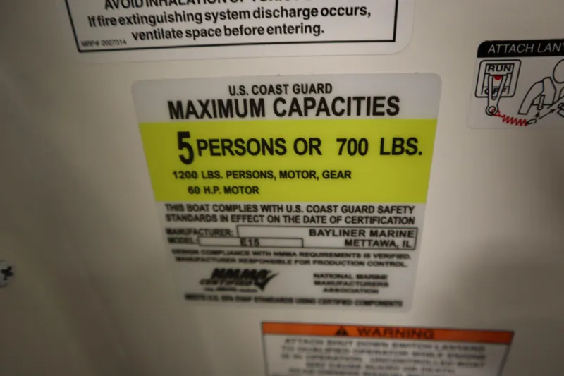 Slide: The Image of 2025 Bayliner M15 MX COMFORT PACKAGE capacity label: 5 persons or 700 lbs, 60 HP motor. - 21