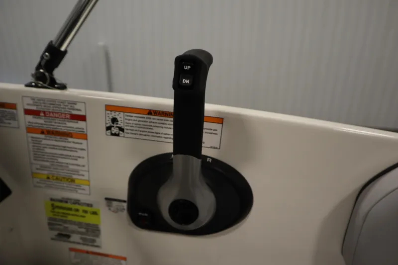 Slide: The Image of Control lever on 2025 Bayliner M15 MX COMFORT PACKAGE boat dashboard. - 23