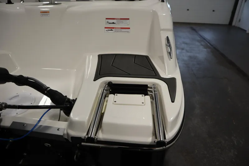 Slide: The Image of 2025 Bayliner M15 MX COMFORT PACKAGE boat with swim platform and ladder. - 27