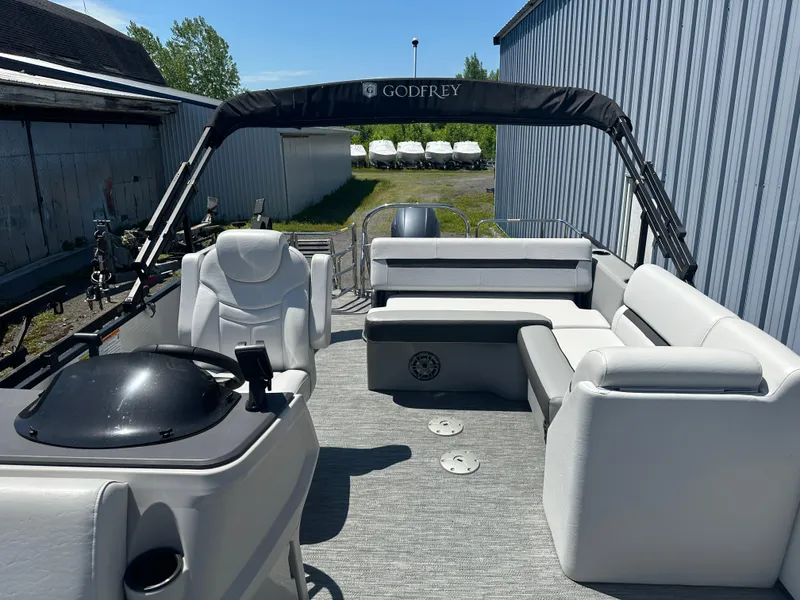 Slide: The Image of 2022 Godfrey SWEETWATER 2286 SFL pontoon boat with spacious seating and modern design. - 11