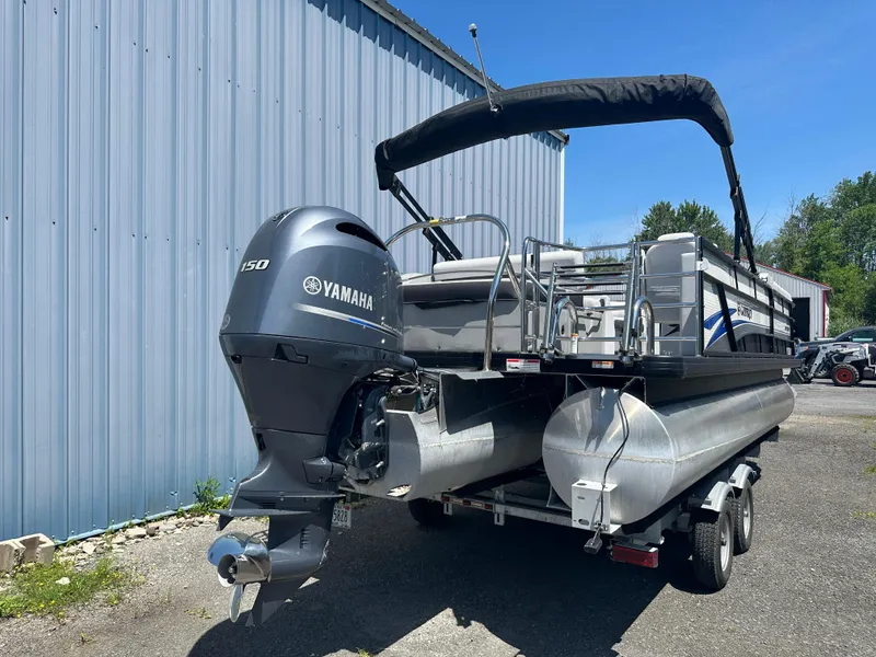 Slide: The Image of 2022 Godfrey SWEETWATER 2286 SFL pontoon boat with Yamaha engine on trailer. - 4