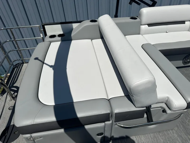 Slide: The Image of 2022 Godfrey SWEETWATER 2286 SFL boat seating area with gray and white upholstery. - 6
