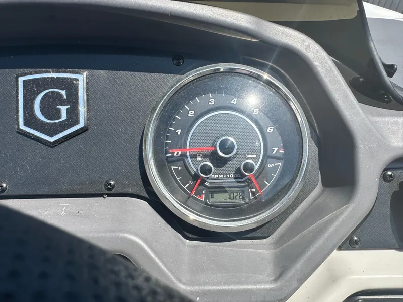 Slide: The Image of Dashboard of 2022 Godfrey SWEETWATER 2286 SFL with tachometer and logo. - 7