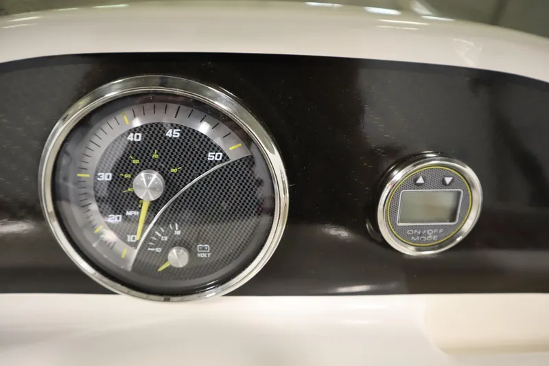 Slide: The Image of Dashboard of 2025 Bayliner Element M15 boat with speedometer and digital display. - 18