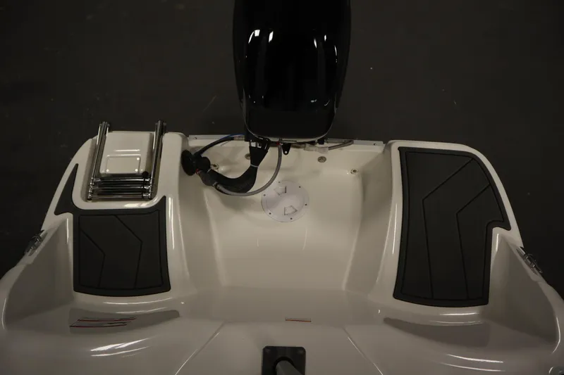 Slide: The Image of 2025 Bayliner Element M15 boat stern with motor and swim platform. - 25