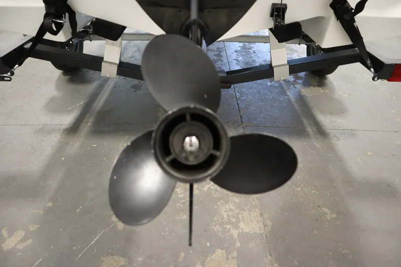 Slide: The Image of 2025 Bayliner Element M15 boat on trailer in indoor storage facility. - 29