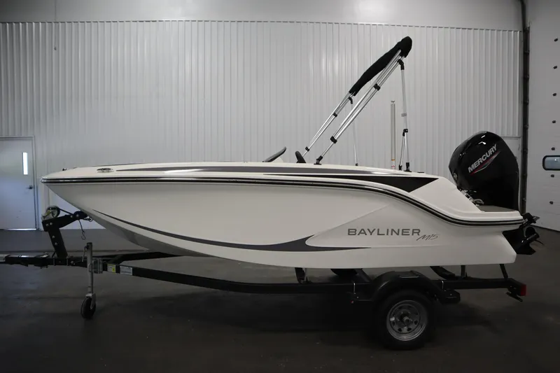Slide: The Image of 2025 Bayliner Element M15 boat on trailer in indoor setting. - 8