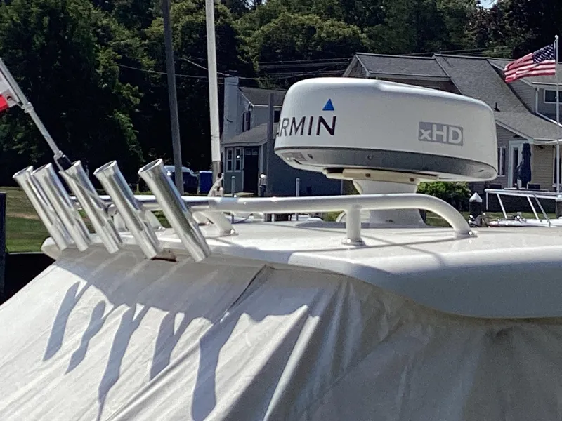 Slide: The Image of 2017 Pursuit DC 325 Dual Console boat with Garmin xHD radar and rod holders. - 10