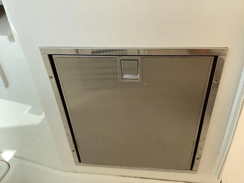 Slide: The Image of Stainless steel hatch on 2017 Pursuit DC 325 Dual Console boat. - 26