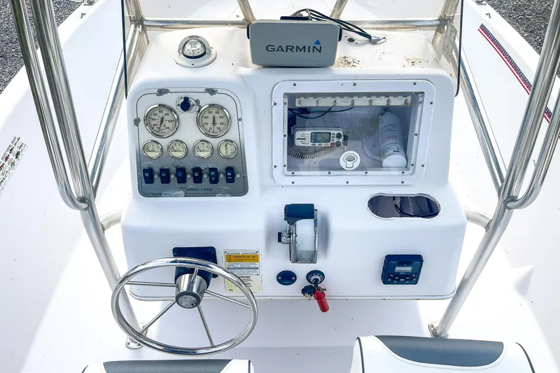 Slide: The Image of Control panel of a 2000 Pro-Line 20 Sport boat with Garmin navigation system. - 10