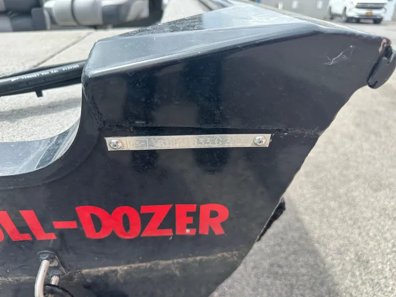 Slide: The Image of 2013 Tracker Super Guide V-16 SC boat with visible identification plate and "BULL-DOZER" text. - 4