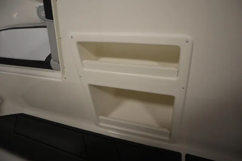 Slide: The Image of Interior storage compartments of 2025 Bayliner M17 ELEMENT MX COMFORT boat. - 18
