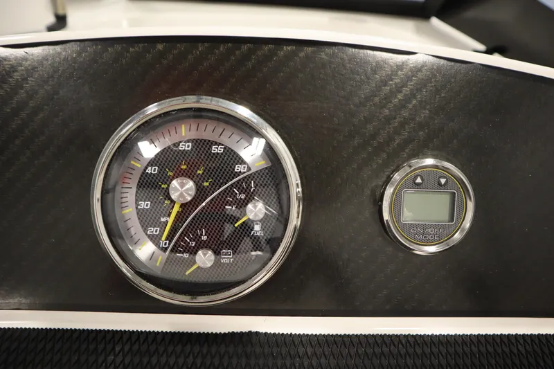 Slide: The Image of Dashboard of 2025 Bayliner M17 ELEMENT MX COMFORT with speedometer and digital display. - 22