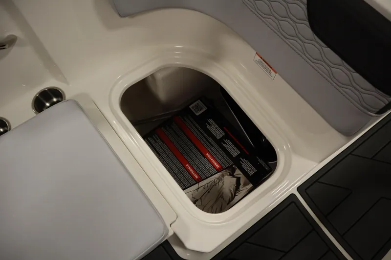 Slide: The Image of Storage compartment in 2025 Bayliner M17 ELEMENT MX COMFORT boat interior. - 29