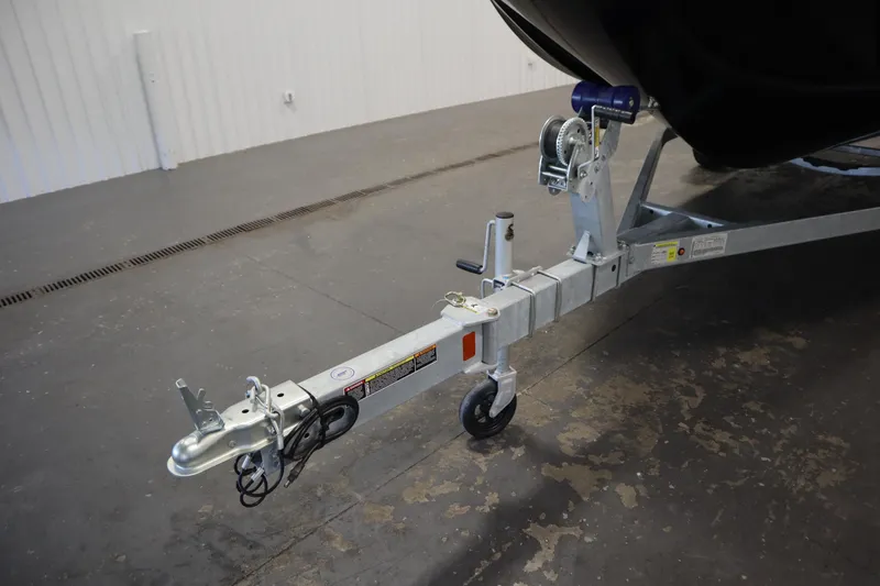 Slide: The Image of Trailer hitch of 2025 Bayliner M17 ELEMENT MX COMFORT boat in a garage setting. - 42