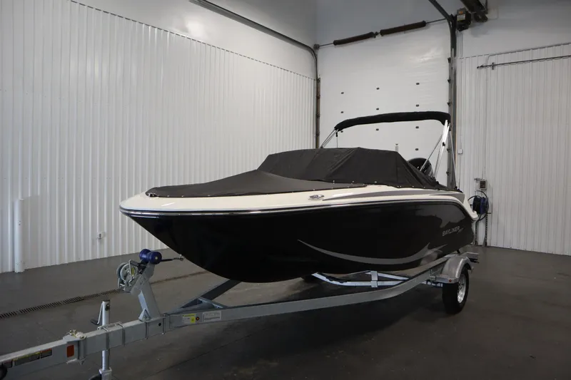 Slide: The Image of 2025 Bayliner M17 ELEMENT MX COMFORT boat on trailer in indoor storage. - 45