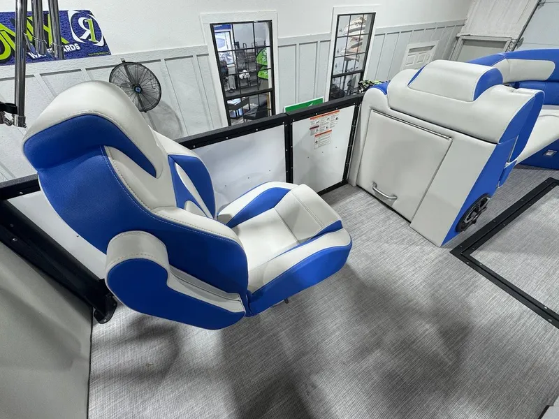Slide: The Image of Interior of 2025 Montara Surf Boss boat with modern dashboard and seating. - 10