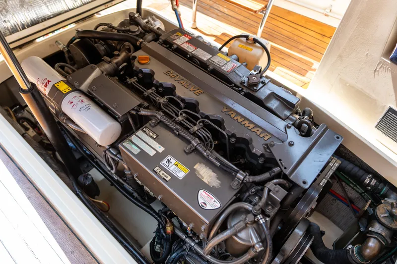 Slide: The Image of Engine of 2007 Hinckley Picnic Boat EP, featuring Yanmar branding and detailed components. - 46