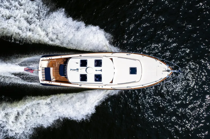 Slide: The Image of Top view of 2007 Hinckley Picnic Boat EP cruising on water. - 8