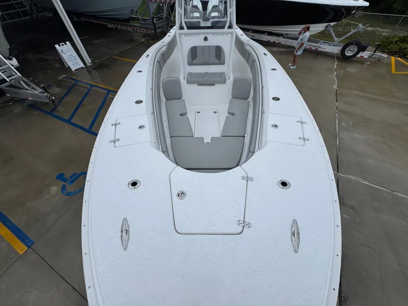 Slide: The Image of 2025 Cape Horn 32 XS boat, top view, showcasing spacious deck and seating area. - 20