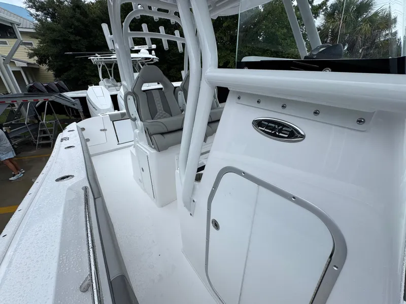 Slide: The Image of 2025 Cape Horn 32 XS boat interior with sleek seating and modern design. - 26