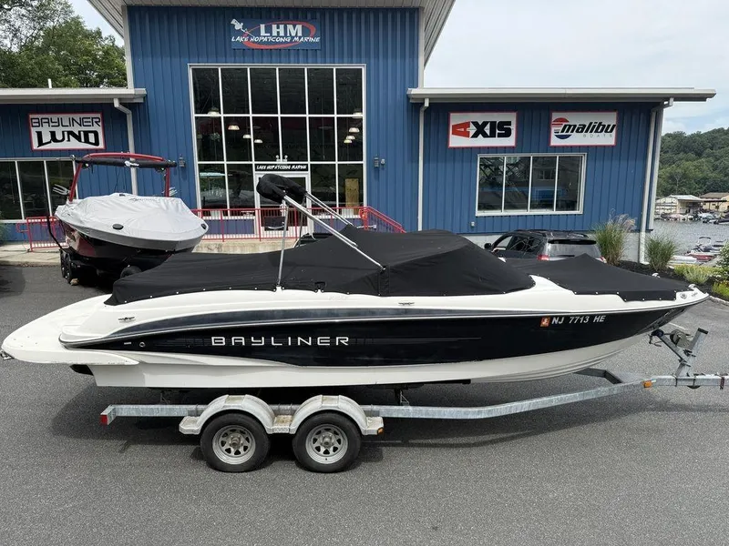 Slide: The Image of 2012 Bayliner 235 BR boat on trailer at Lake Hopatcong Marine dealership. - 19