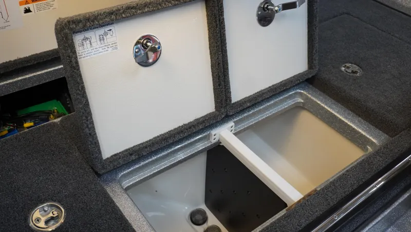 Slide: The Image of 2024 Ranger Z518 Ranger Cup Equipped boat storage compartments open. - 18