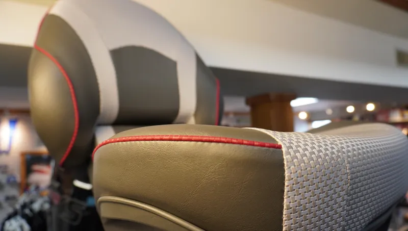 Slide: The Image of 2024 Ranger Z518 Ranger Cup Equipped boat seat with red accents and textured fabric. - 19