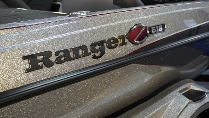 Slide: The Image of 2024 Ranger Z518 Ranger Cup Equipped boat, metallic finish, close-up of logo. - 4