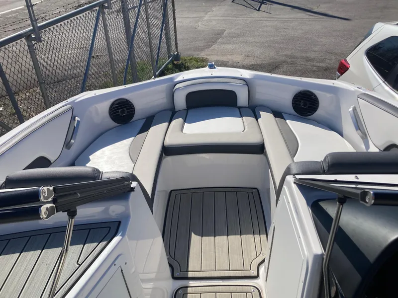 Slide: The Image of 2024 Yamaha Boats 195S interior with cushioned seating and speakers. - 10